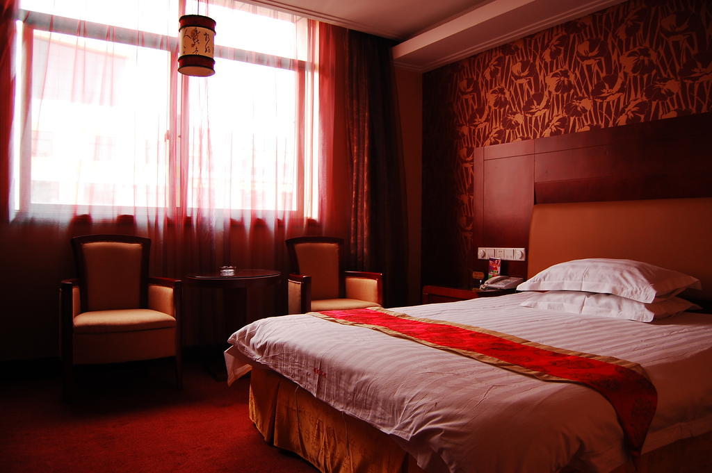 Jinyao Business Hotel I-wu Pokoj fotografie