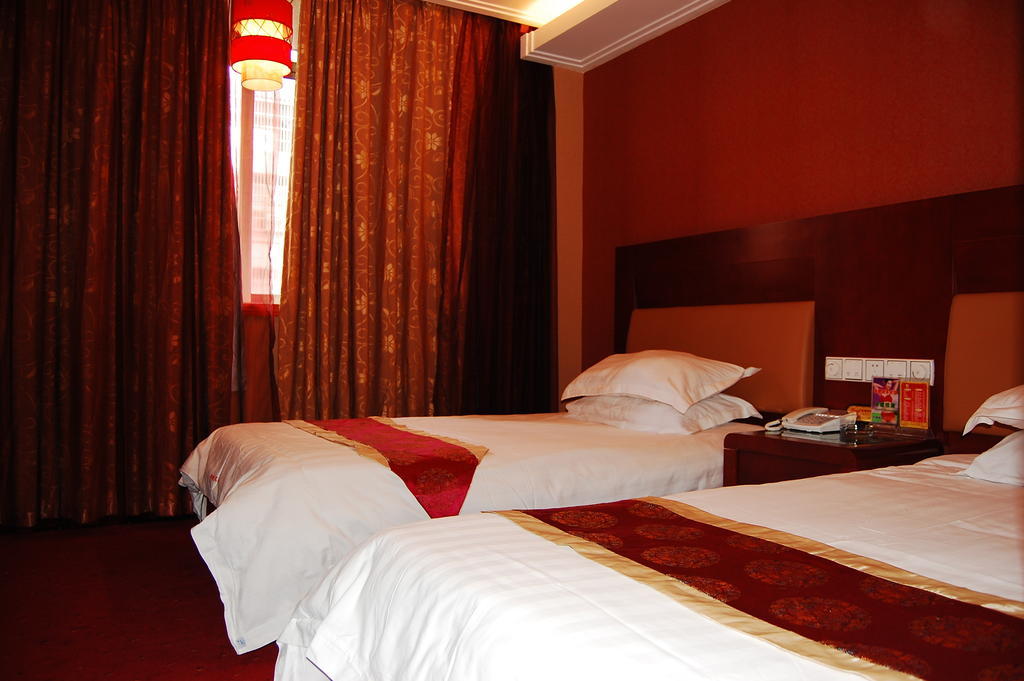 Jinyao Business Hotel I-wu Pokoj fotografie