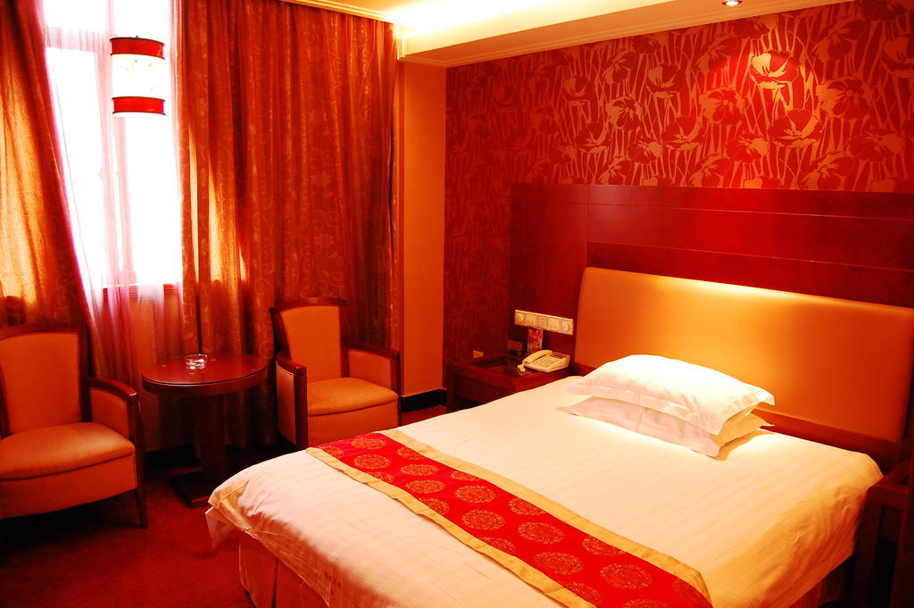 Jinyao Business Hotel I-wu Pokoj fotografie