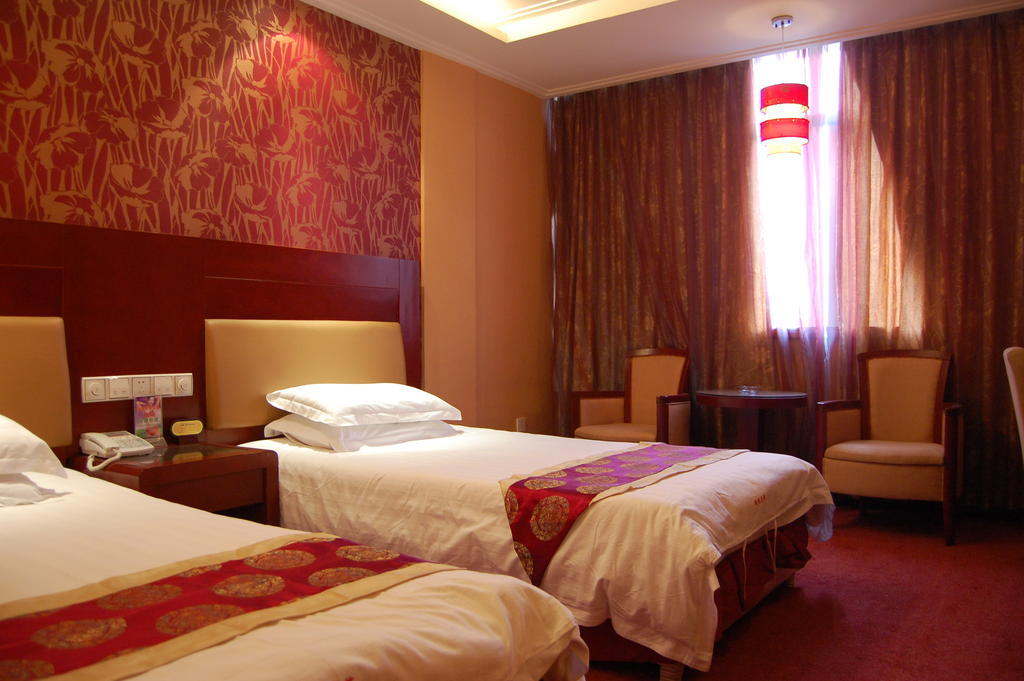 Jinyao Business Hotel I-wu Pokoj fotografie