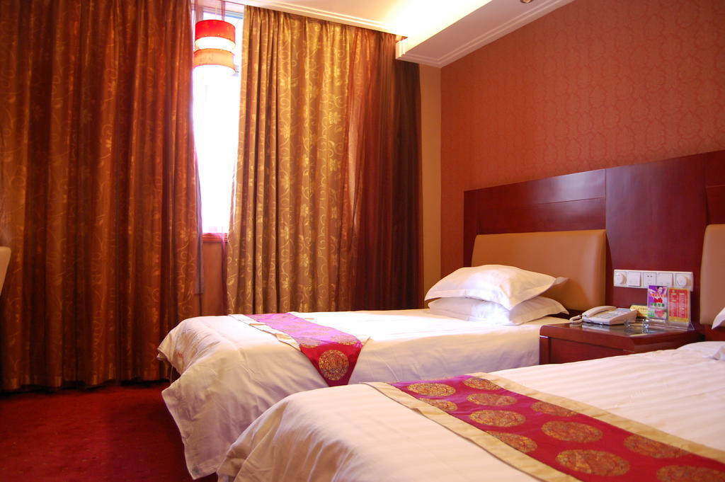 Jinyao Business Hotel I-wu Pokoj fotografie