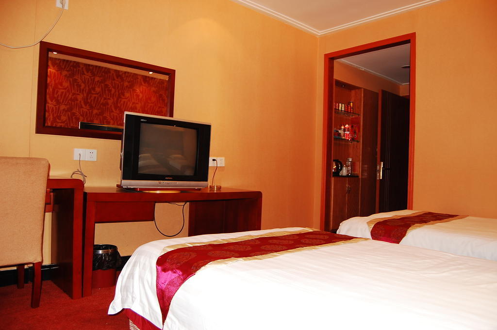 Jinyao Business Hotel I-wu Pokoj fotografie